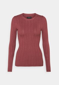 Ribbed long-sleeve sweater in dusty rose color, made from soft material. Features a round neckline and a form-fitting design.