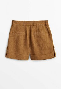 Brown linen shorts with a tailored design. Features two back pockets and folded cuffs at the hem. Smooth texture and structured fit.