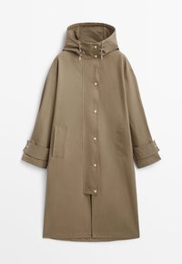 Brown waterproof coat with a hood, featuring snap buttons, side pockets, and rolled cuffs. Smooth texture and knee-length design.