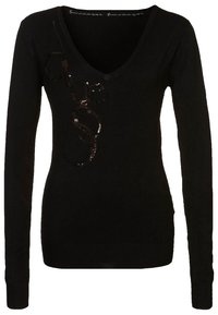 Pullover nero a maniche lunghe con scollatura a V, decorato con paillettes che formano la parola "Guess" sul davanti. Realizzato in tessuto morbido con una vestibilità aderente.