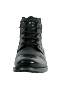 Bottes de cheville en cuir noir avec un bout arrondi, avec un système de laçage et une fermeture éclair sur le côté. Fini texturé et détails de couture renforcée.