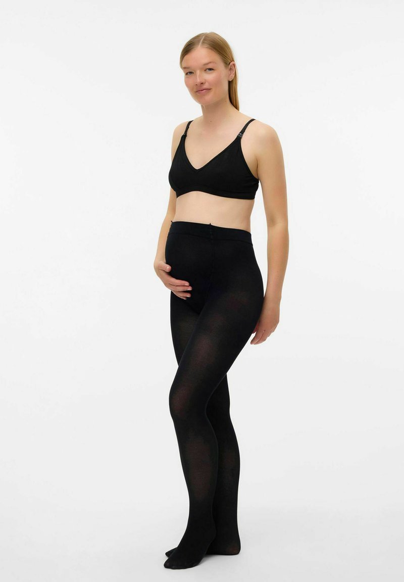 Czarne legginsy ciążowe z miękkiego, elastycznego materiału, wyposażone w wysoką talię i bezszwowy design, w połączeniu z pasującym czarnym biustonoszem bralet.