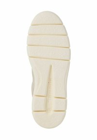 Semelle de sneaker blanche avec une texture, un grip pattérné, des nervures et des crampons pour l'accroche. Marquée avec "37" et la marque.