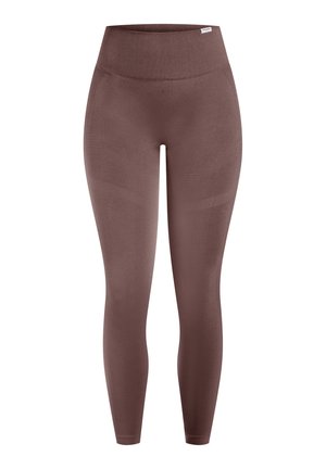 Brune leggings med høj talje, glat tekstur og tætsiddende pasform. Har diskrete mønstre på benene og en bred linning.