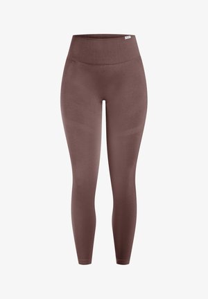 Brune leggings med høj talje, glat tekstur og tætsiddende pasform. Har diskrete mønstre på benene og en bred linning.