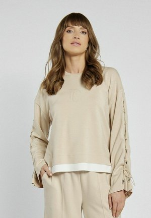- Bluza