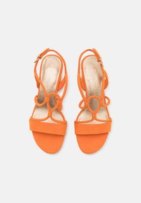 Marco Tozzi Sandaalit nilkkaremmillä - orange