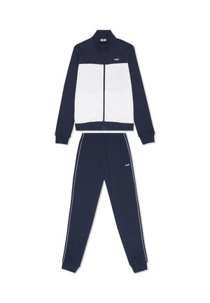 Marineblaue und weiße FILA Zip-up-Jacke mit passenden marineblauen Jogginghosen, die weiße Seitenstreifen und Logodetails aufweisen.