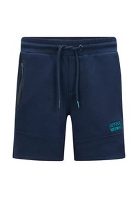 Pantaloni corti blu navy realizzati in tessuto morbido, con vita elastica e cordino regolabile, tasca laterale con zip e dettaglio ricamato "RETOUR PERFORMANCE".