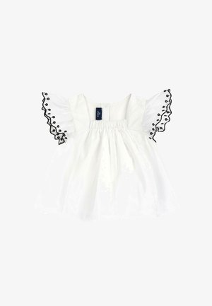 Hvid babykjole med flæsekorte ærmer med sorte broderede kanter og et rynket liv.