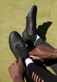 PHANTOM LUNA II ACADEMY  - Moulded stud football boots - black