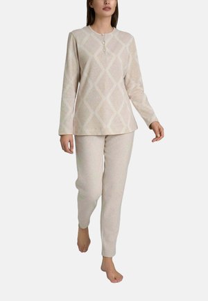 Set di abbigliamento da casa color beige chiaro composto da una parte superiore con motivo a rombi, maniche lunghe e pantaloni in un morbido tessuto testurizzato.