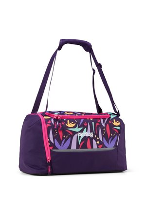 Purple duffel bag with floral pattern in pink, orange, and green. Features a padded handle and adjustable shoulder strap. Front zip pocket included.