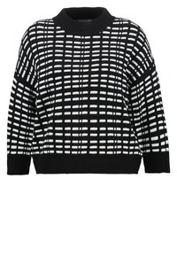 Czarnobiały sweter w kratkę, z okrągłym dekoltem i ściągaczami na rękawach. Materiał wydaje się miękki i teksturowany.