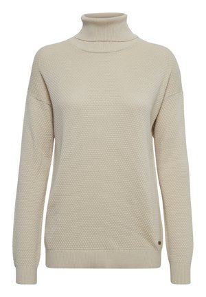 Pull encolure ras du cou beige avec un motif en nid d'abeille texturé, coupe ample, poignets et ourlet côtelés, comportant un petit accent de marque sur le côté.