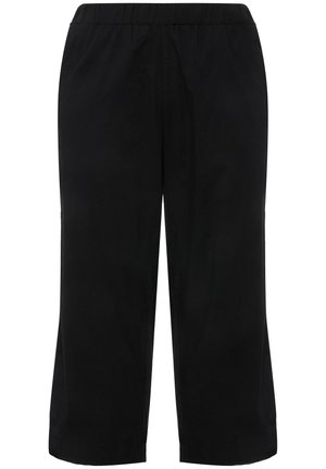 Zwarte cropped broek met een elastische tailleband, gemaakt van gladde stof. Heeft twee zijzakken en een losse pasvorm.