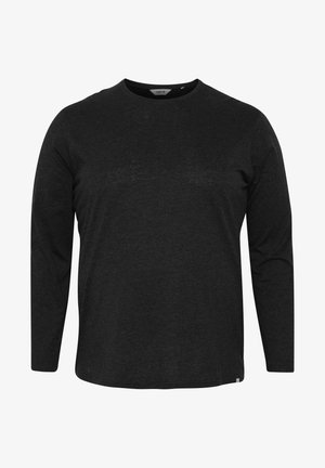 Schwarzes Langarmshirt aus weichem Stoff. Rundhalsausschnitt und lockere Passform, mit einem kleinen Logostick am unteren linken Naht.