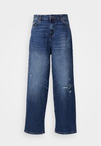 Bredde blå denim jeans med et slidt design, der har flosset kant og falmede sektioner, som giver en afslappet pasform og klassisk look.