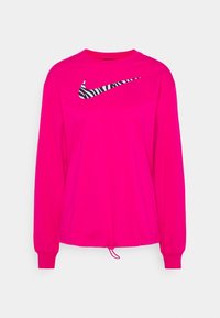 Camisa de manga larga en tela rosa brillante con dobladillo curvo. Presenta un logo de Nike con rayas de cebra en blanco y negro en el pecho. Cordón ajustable en la parte inferior.