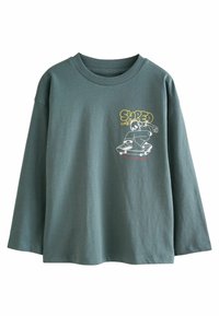 Camică cu mânecă lungă, de culoare teal, din bumbac, cu guler rotund, având un grafic alb de skateboard și textul "SHRED LIFE" în galben.