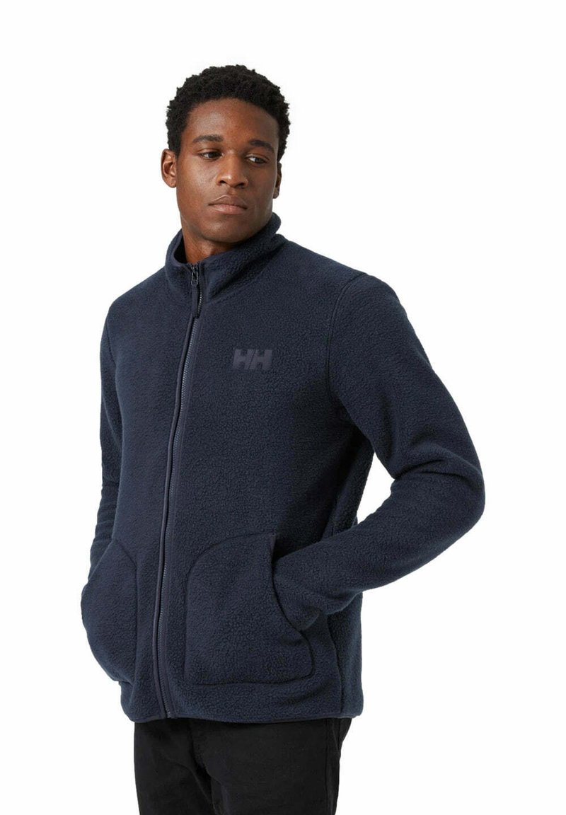 Navy fleece jacket with a high collar, zip front, two front pockets, and embossed logo on the chest. Soft texture and casual fit.