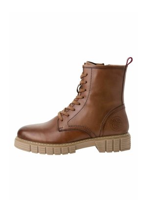 Bottine en cuir marron avec un bout rond, un laçage à l'avant, une semelle en caoutchouc et une semelle texturée beige. Dispose d'une languette rouge à l'arrière.