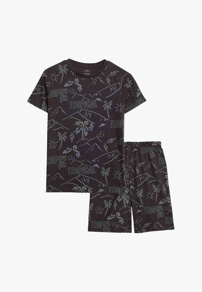 Conjunto de camisa negra de manga corta y pantalones cortos con dibujos lineales blancos de temática tropical, que incluyen palmeras, montañas, soles y la palabra "TROPICAL".