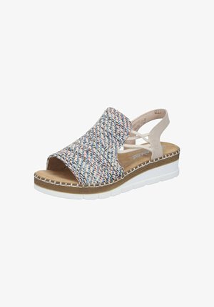 Sandale pour femme à bout ouvert avec dessus tissé multicolore, bride beige à la cheville, semelle intérieure rembourrée, et semelle épaisse blanche avec détail de coutures.