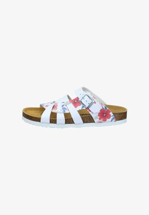 White sandal with cork sole, adjustable silver buckle, and floral pattern on two straps over foot and three straps over toes.