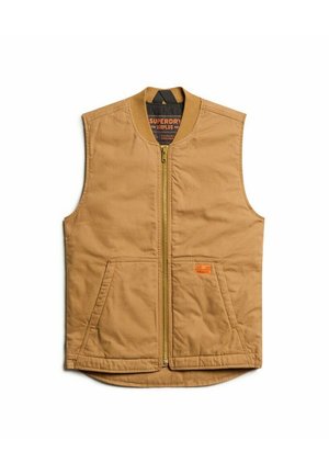 Gilet sans manches beige avec une fermeture éclair à l'avant, deux poches avant et une petite étiquette orange, fabriqué à partir d'un tissu durable au toucher lisse.