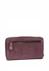 Leren portemonnee in een diep paarse kleur, voorzien van een ritssluiting, een patch met ankerlogo en contrasterende stiksels langs de randen.