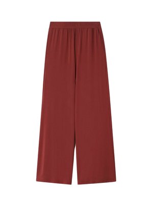 Hose mit weitem Bein in einfarbigem Rostton mit elastischem Bund und seitlichen Eingrifftaschen, hergestellt aus glattem Stoff.