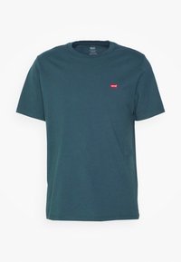 Mørk teal bomulds T-shirt med rund halsudskæring, korte ærmer og et lille rødt Levi's-logo på brystet. Glat tekstur, klassisk pasform.