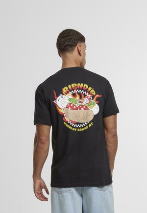 Black cotton t-shirt featuring colorful graphic of a hot dog with cartoon animals and flames, text "RIPNDIP WHERE MY DAWGZ AT" in bold yellow.