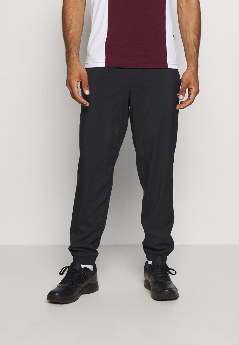 Reebok Verryttelyhousut - black