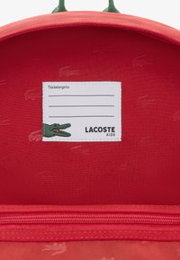 Lacoste CORE SOLID - Skolväska - red