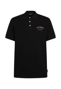 Polo noir en coton avec un col classique, une patte de boutonnage à trois boutons et un logo brodé blanc sur le côté gauche de la poitrine.