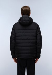 Black puffer jacket with a hood, featuring a quilted design and visible stitching. Back view shows a relaxed fit and textured fabric.
