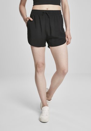 Black shorts made of lightweight fabric, featuring an elastic waistband with drawstring, side pockets, and a relaxed fit.
