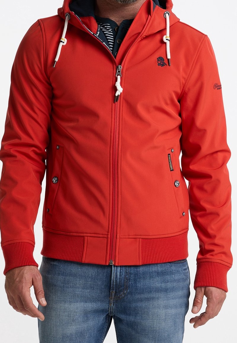 Veste à capuche rouge avec fermeture éclair, poignets et ourlet élastiques. Comprend des cordons de serrage, des poches latérales à fermetures à pression, et un accent logo.