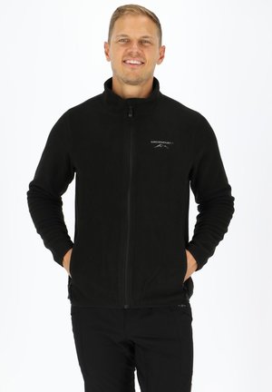 Black fleece jacket with a full zip and stand collar. Features logo detailing, long sleeves, and side pockets for added functionality.