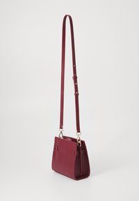 Tommy Hilfiger HERITAGE MINI SATCHEL - Käsilaukku - raspberry truffle