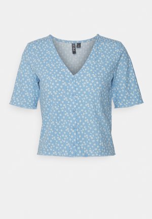 Light blue short-sleeve blouse with a V-neck, featuring a floral pattern, button front closure, and textured fabric.