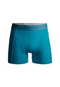 Tökéletesen illeszkedő férfi boxeralsó, teal színben, sima, rugalmas anyagból készült. Szürke derékpántja "MUCHACHOMALO" logóval díszített, szoros illeszkedésű és lapos varrású.