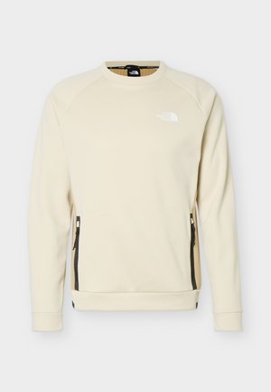 Μπεζ φούτερ μακρυμάνικο με λαιμόκοψη τύπου crewneck, με φερμουάρ μπροστά στις πλευρές και μικρό λευκό λογότυπο The North Face στο αριστερό στήθος.