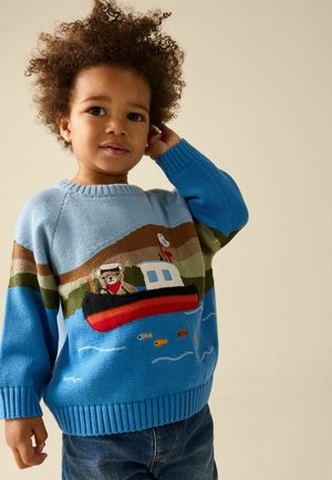 Blue knitted sweater featuring a boat, bear, and dog designs. Ribbed cuffs and hem, with colorful landscape accents and fish patterns.