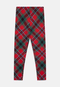 Leggings à carreaux rouges et verts avec une texture confortable, présentant un mélange de carrés et de lignes diagonales dans des couleurs contrastées.