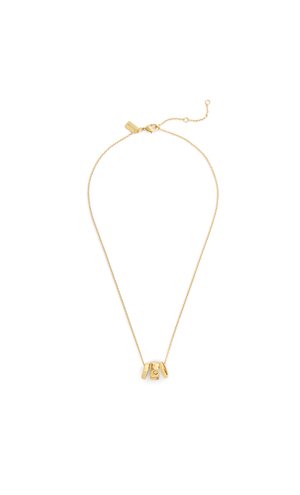 Collana con catena d'oro e tre ciondoli circolari in oro, uno inciso con un motivo di mezzaluna e stella, su sfondo bianco.