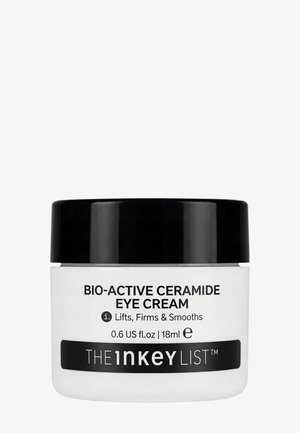 Pot de The Inkey List Bio-Active Ceramide Eye Cream avec couvercle noir, étiqueté pour lifter, raffermir et lisser la peau, taille 18 ml.
