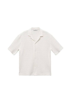 White short-sleeve shirt featuring a hexagonal knit pattern, classic collar, and button-down front. Textured, lightweight fabric.
